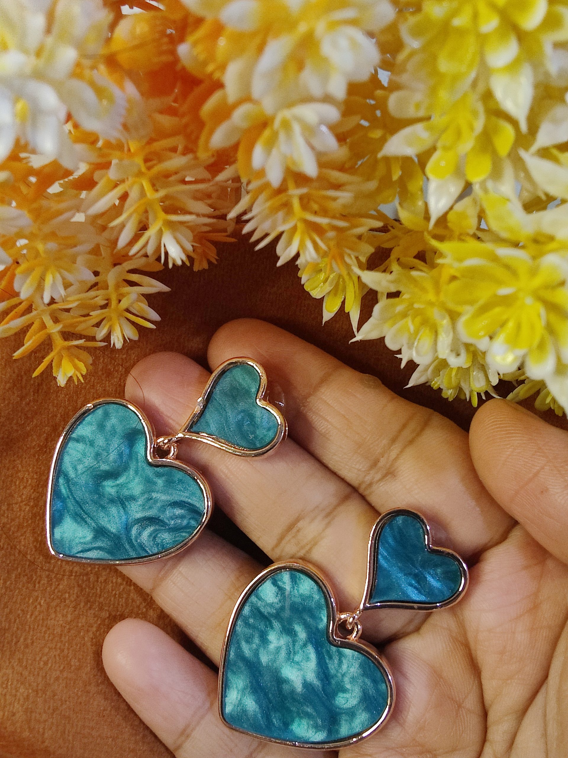 Mesmarizing Teal Green Dual Heart Statement Earrings With Marble Textured Detailing - Image 2