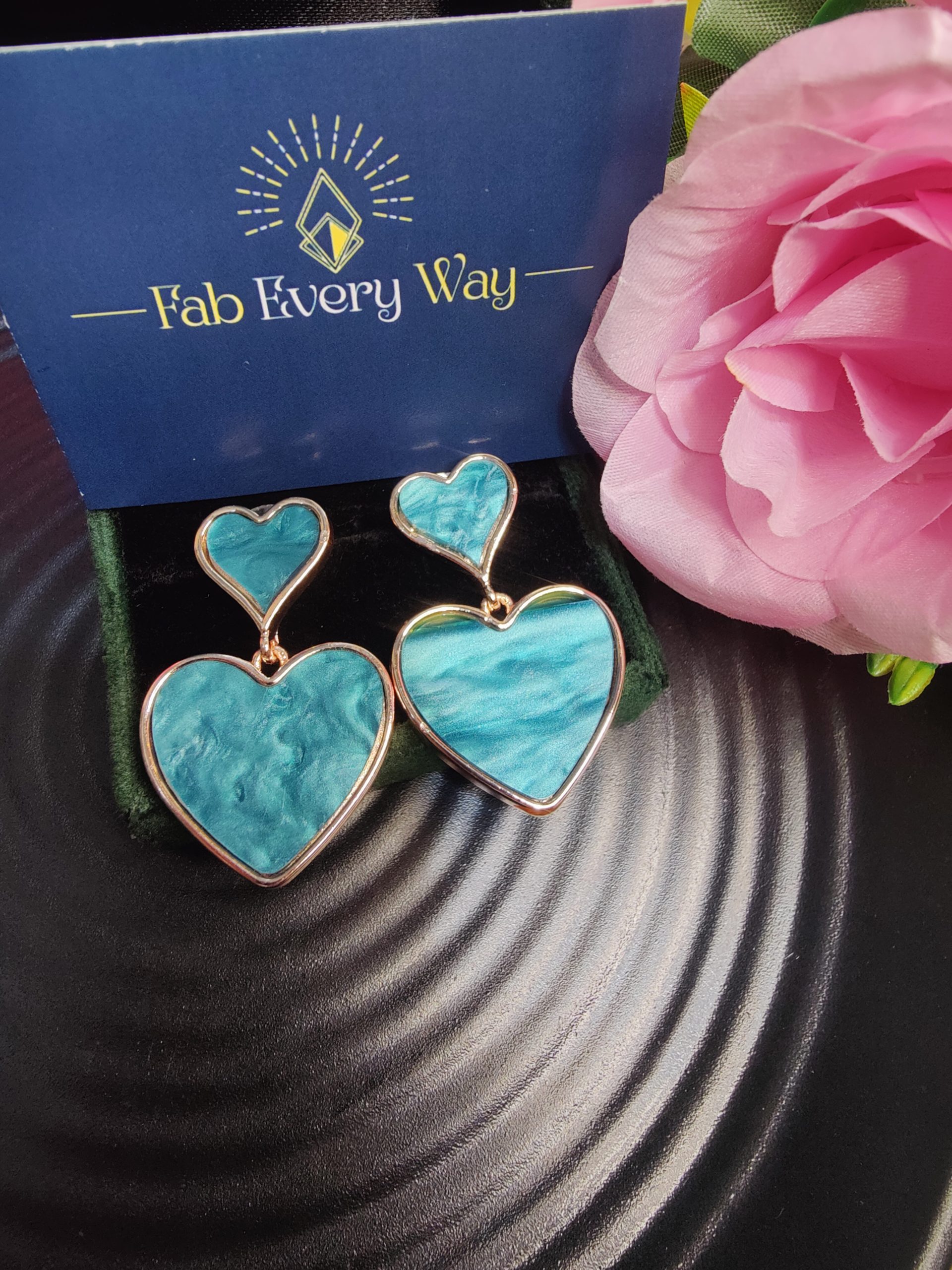Mesmarizing Teal Green Dual Heart Statement Earrings With Marble Textured Detailing